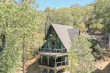 Perched on a mountain in Lake Arrowhead, the home enjoys uninterrupted views of the forest surroundings. 