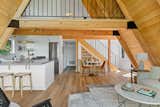 The original wood ceilings and beams were walnut-blasted back to their former glory in this 1968 A-Frame home.