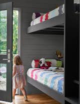 Bunk room in River House 2 by Bentley Tibbs Architect