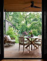 Back patio at River House 2 by Bentley Tibbs Architect