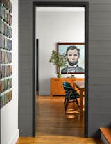 Brenda's oil portrait of Abraham Lincoln is on full view in the couple's dining room, as seen through the connecting hallway.