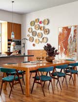 The Bogarts’ kitchen boasts a painting by Otis Husband, an artist and art professor from Houston. The cabinets are walnut with an oiled finish.
