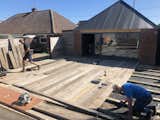Outfitting the back-deck with sanded scaffolding boards.