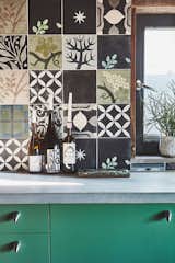 The kitchen tiles came from a shop the couple visited while driving through Brussels en route to Amsterdam.