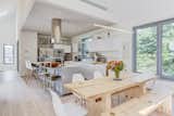 The family dining table was specially designed by Turett using wood that his daughter had milled from a fallen spruce tree.