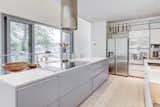 The family kitchen was purchased off of a showroom floor from the Italian company, Valcucine. It was completely modular in design so the architect could rearrange and assemble it to his liking.