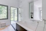 The architect's wife wanted the home to be full of natural light so glass was used throughout the structure.
