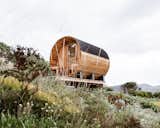 "Rugged and wild, Tasmania is beautiful year-round, and we wanted to use our shack in every season," say co-owners and sisters Lara McCartney and Clair Peachey. "As winters can be cold, the sauna provides a warm, peaceful cocoon; it’s a beautiful way to enjoy the weather and storms that roll in over the Tasman Peninsula from across the Tasman Sea. From the sauna, you can watch the tuna boats returning with their catch, humpback whales coming home with their calves, and countless seabirds swarming."