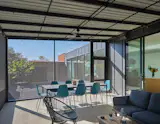 Both sliding glass and screens create an indoor-outdoor environment that maximizes space.