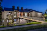 Exterior, Stone Siding Material, Gable RoofLine, Wood Siding Material, House Building Type, and Metal Roof Material  Photo 2 of 13 in Emory Oak Drive Residence by Darren Heine