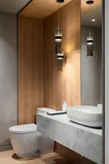 The powder room is a truly spectacular bit of surprise. Hidden behind a millwork door - this wood and plaster bathroom with custom vanity is turned into one of the richest rooms of the apartment. 