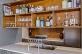 Kitchen, Ceiling Lighting, Refrigerator, Range, Undermount Sink, Laminate Cabinet, Engineered Quartz Counter, and Wood Cabinet  Photo 9 of 52 in Rancho Mirage Lane by Chris Salay