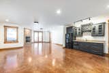 Kitchen, Granite Counter, Recessed Lighting, Concrete Floor, Drop In Sink, Wood Cabinet, and Refrigerator  Photo 7 of 9 in Mountain Life Estate by sam williams
