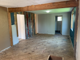 Living Room Before (Family Room & Bathroom Facing North)  Photo 10 of 23 in Scandinavian Pioneer Home by sam williams