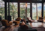 The "criss-cross" floor plan and high ceilings make the most of the small, mountainous site making the home feel more expansive than its 1200 sq ft layout would indicate. 