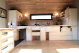 Redwood and Birch Ply bespoke kitchen with fold out table.
