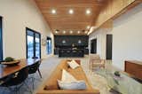 Open floor plan with wood clad 15' ceilings