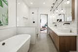 A freestanding soaking tub making this Master Bath a true retreat 