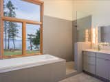 Bath Room, Ceramic Tile Wall, Open Shower, Wall Lighting, Bamboo Floor, Drop In Tub, and Soaking Tub  Photo 5 of 19 in Modern San Juan Islands Retreat by Glassenstump Creations