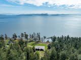 Exterior, Metal Roof Material, House Building Type, Concrete Siding Material, and Shed RoofLine Limitless ocean views from the main house and adjacent guest studio  Photo 7 of 19 in Modern San Juan Islands Retreat by Glassenstump Creations