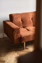 Living Room, Sofa, and Medium Hardwood Floor Sofa  Photo 10 of 20 in Apartment in a modernist building from the 1950s by Michal Martynowski