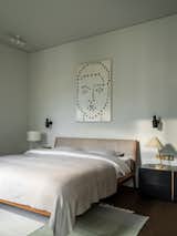 Bed, Ceccotti Collezioni; textile by Atelier Tati; bedside tables, Meridiani; lamps on bedside tables, Kalmar; wall lamps, Rubn; panel by Igor Shelkovsky, Alina Pinsky Gallery.