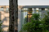 View through the home, to the ocean, from the road