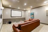 Not only does this 17 1/2’ x 15’ media room possess film projection, surround sound audio, ambient theater lighting and an A/V closet— it also has an under cabinet beverage refrigerator to house any refreshments. 