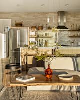 Living Room, Sectional, Concrete Floor, Pendant Lighting, Recessed Lighting, Coffee Tables, and End Tables It's all in the details.  Photo 6 of 11 in The Edge by Adam Goldsmith