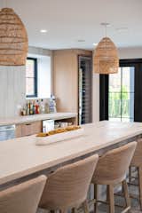 Kitchen, Wine Cooler, and Beverage Center Flanking wine coolers on either side of the bar.  Photo 4 of 15 in Grandview Oasis Basement by West End Interiors