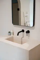 Custom plaster sink - we used Domingue finishes for everything.