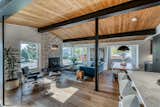 Open plan enhanced by the wood vaulted ceilings and dark beams