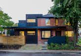 Exterior, Brick Siding Material, Gable RoofLine, Flat RoofLine, Wood Siding Material, Shingles Roof Material, and House Building Type Main exterior approach  Photo 1 of 12 in Follis House by Projekt Studio Architects Inc.