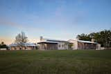 The 4,500 SF main house was designed as a one-story, horizontal, low profile house, featuring an
open floor plan, with the living, dining, and kitchen serving as the core of the home.  Photo 1 of 7 in East Texas Ranch by FPC Architects & Planners