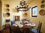 Native Mexican clay floor tiles and mesquite wood were used on the floors  Photo 12 of 13 in Armendaris Ranch by FPC Architects & Planners