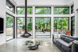 Floor to ceiling windows bringing the green into the Great Room