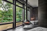 Steam and LED lights create an ambience of a cozy fire in the master bedroom and in front of the tub