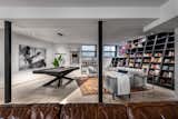The basement library with a climbable bookshelf
