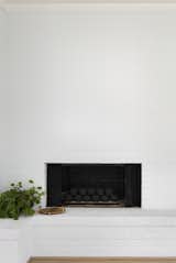 White painted brick fire place.