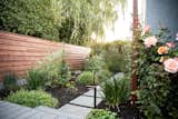 Soft plantings add interest to the small garden.
