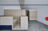 A series of customised cuboids in this open-concept space replaces the conventional room plan of a public housing flat.