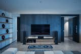 Living Room, Console Tables, Concrete Floor, Bookcase, Sofa, and Ceiling Lighting Living room  Photo 15 of 19 in Techno Lover Apartment by Perspektiv