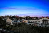 MILLION DOLLAR 360 DEGREE SKYLINE VIEWS SHOW THE BEAUTY AND ROMANCE OF GARDEN DISTRICT NEW ORLEANS LIVING, SEEN HERE AT TWILIGHT.