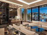 Contemporary Living Room and Custom Bar and Wine Cellar with views to waterway. 