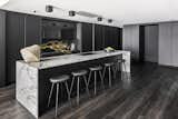 B+G Design Miami Kitchen Featuring 14 Foot Island & Concealed Cabinets