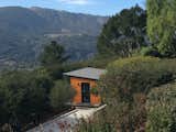 Steve built a “shed-teau” below the house. 
It contains a storage area and a home office/workout space, and has a deck looking out towards Garland Ranch Regional Park.