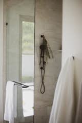 Bath Room A large bright owner's shower with outdoor shower access.  Photo 15 of 25 in The Gernert Home by Jamie Gernert
