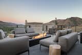 Deck Terrace: Gloster furnishings create multiple unique spaces for the owners to enjoy the views