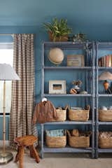 Kids Room, Bookcase, Bedroom Room Type, Toddler Age, Storage, Shelves, Playroom Room Type, Boy Gender, and Neutral Gender The bookshelves double as a place to display some of our favorite pieces from our son's wardrobe.  Photo 5 of 7 in Beach Charm Nursery by Sayler Studio