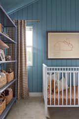 Kids Room, Toddler Age, Playroom Room Type, Bed, Bedroom Room Type, Bookcase, Boy Gender, Storage, and Neutral Gender One of our favorite pieces in this room is the vintage print, "Zoo Des Petits" we found on Etsy.   Photo 6 of 7 in Beach Charm Nursery by Sayler Studio